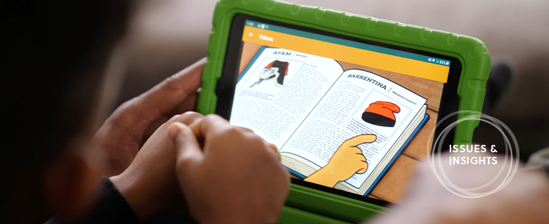 A child using a tablet representing Conducting Research That Is Both Rigorous and Culturally Responsive