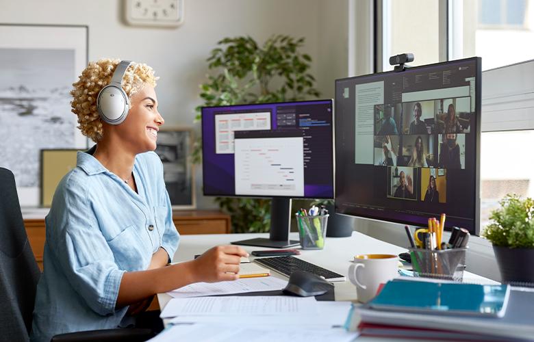 A woman on video call representing From Strangers to Colleagues: Cultivating an Effective Virtual Research Community