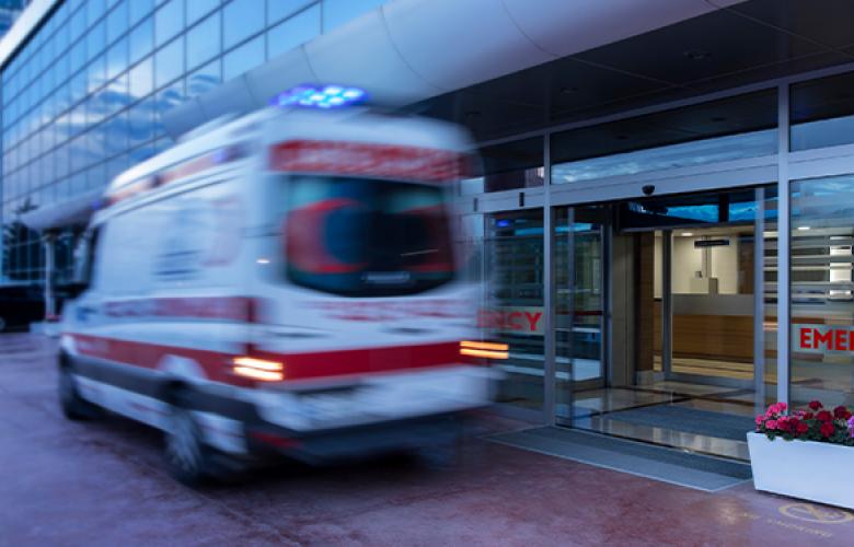 Ambulance in front of a hospital