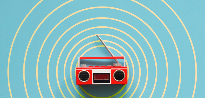 Illustration of a radio representing Transforming Lives Through Radio!