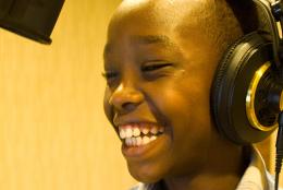 Billy Niyingabiye recording a program for L3