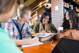 Using Data to Strengthen Your High-Dosage Tutoring Program A photo of teacher and students representing Using Data to Strengthen Your High-Dosage Tutoring Program