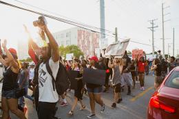 A photo of a protest representing Racism is a Public Health Problem. What Can We Do?