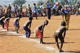 The Most Sacred of Goals A photo of children in a refugee camp representing The Most Sacred of Goals