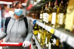Balancing Competing Priorities: Preventing Substance Misuse during COVID-19 A photo of a person shopping for alcohol representing Balancing Competing Priorities: Preventing Substance Misuse during COVID-19