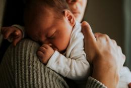 Promoting Mental Health during the Postpartum Period A photo of a mother and child