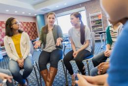 After the Violence—Using SEL to Prepare the Next Generation of Citizens A photo of students having a discussion